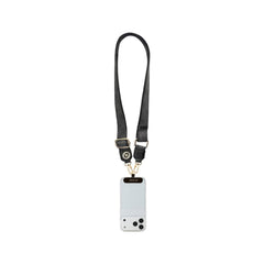 Guess Correa Universal para Teléfono – Correa de Polipiel Negra con Logo de Strass, Sujeción Segura y Diseño Elegante